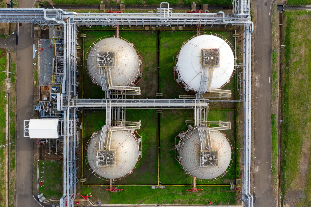 Aerial view of an industrial facility with large steel-walled structures served by D&S Utility Services natural gas infrastructure